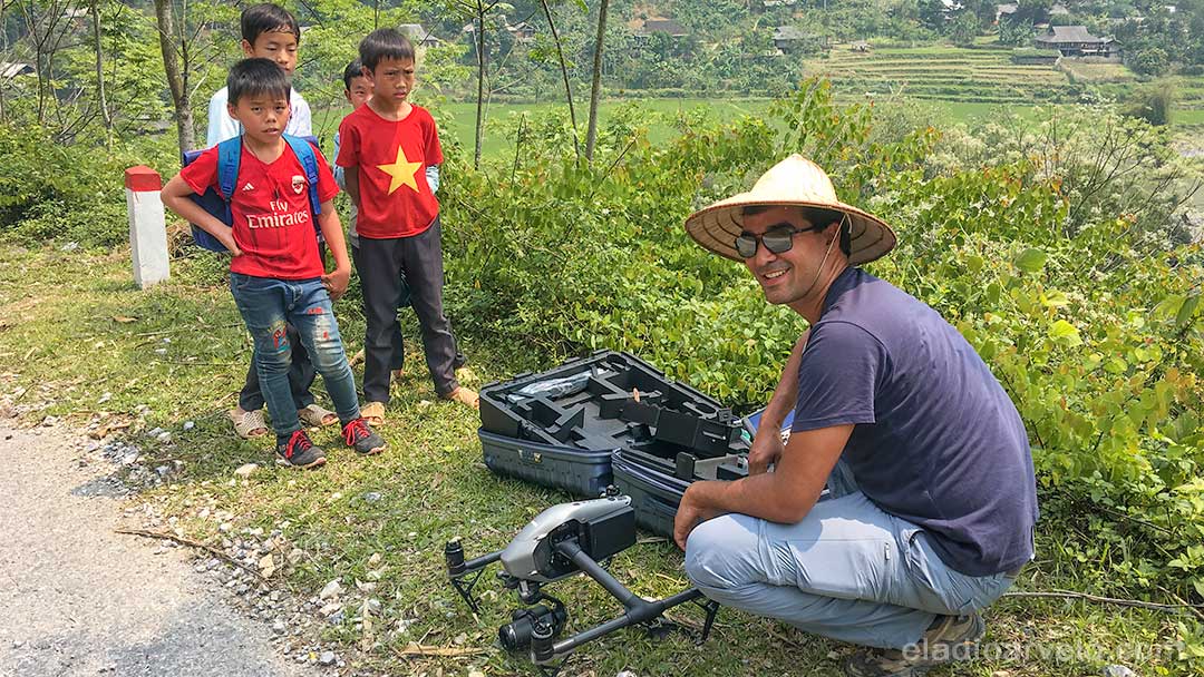 Eladio preparing to fly his drone with an audience in Ha Giang. (Photo credit: Shareef Haq).